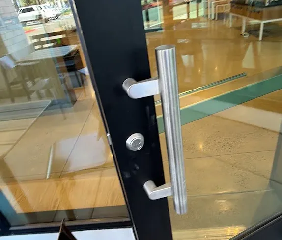 Digital keypad lock on a commercial glass door