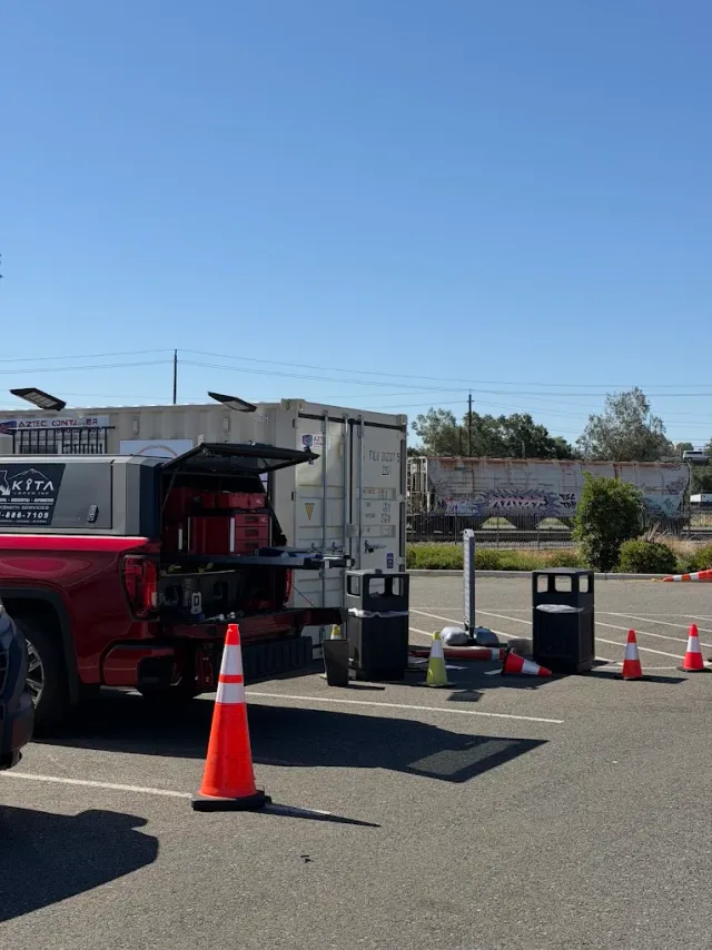 Kita Locks mobile service truck with locksmith equipment at a work location.